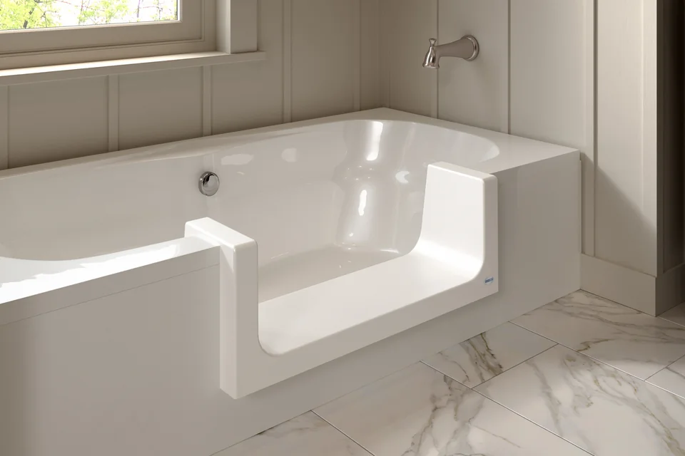 Close view of a step-through insert and the threshold that remains in the tub wall.